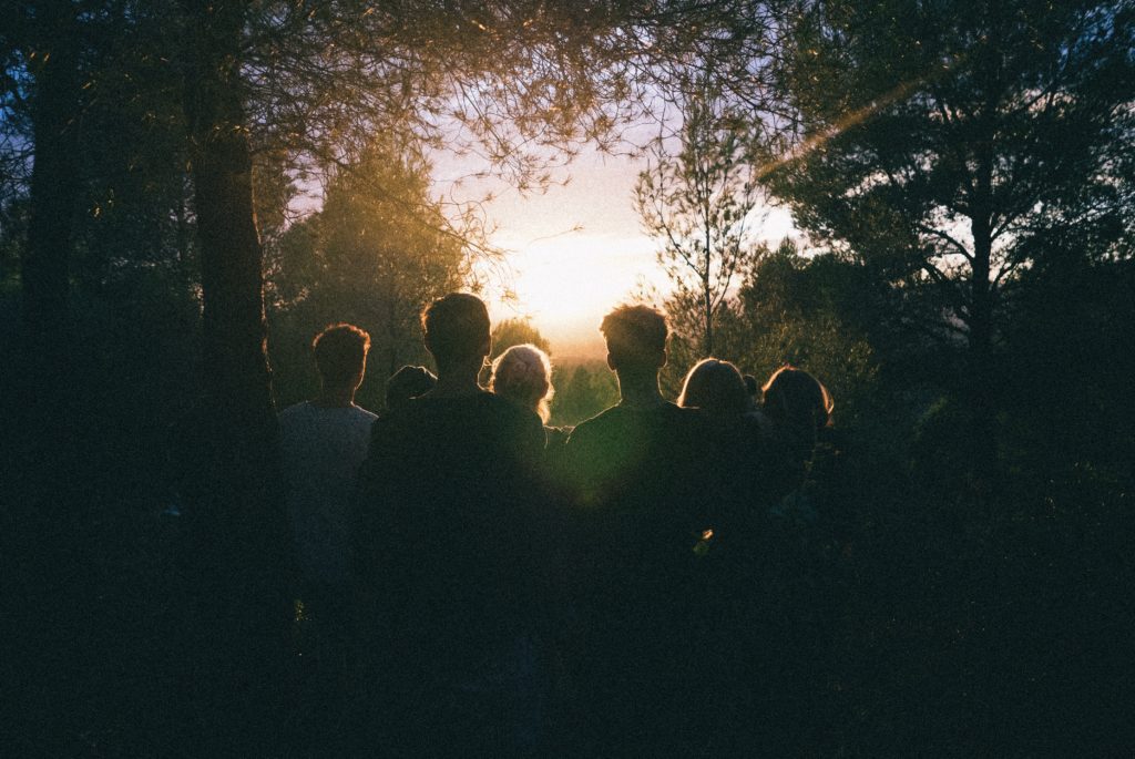 Group_Looking_Into_Sunrise_Sunlight